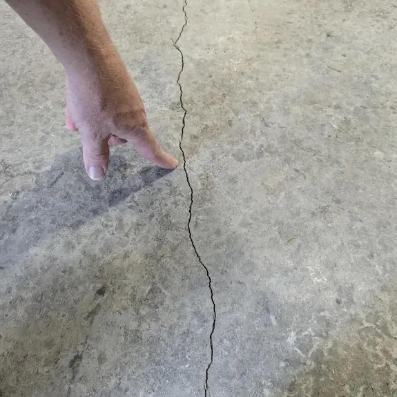 Cracked concrete pole barn floor
